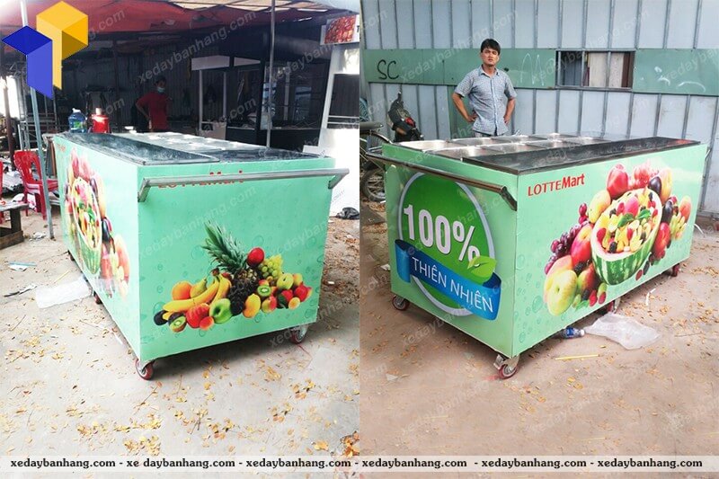 xe đẩy bán trái cây lề đường