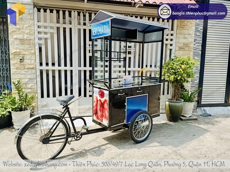 hình ảnh xe đạp bán cá viên chiên